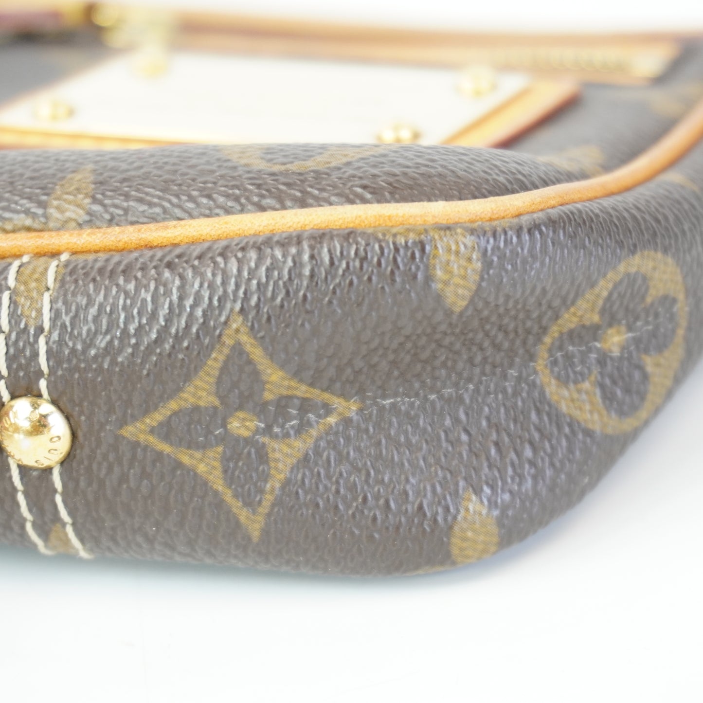 Louis Vuitton	Limited Edition Mono Canvas Pochette