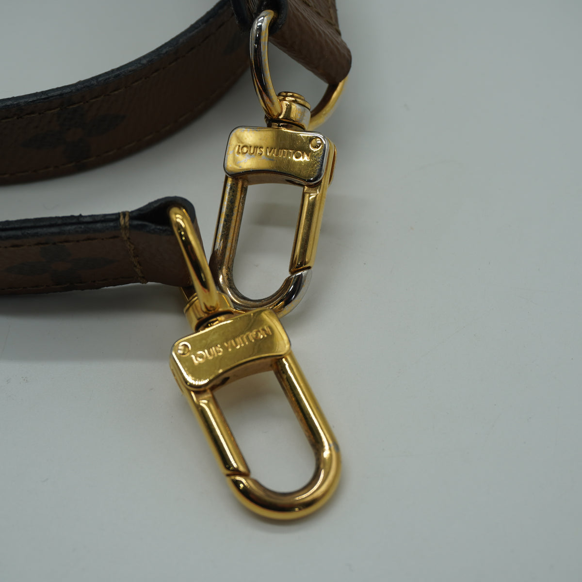Louis Vuitton	Pochette Métis Small Monogram Reverse Canvas GHW
