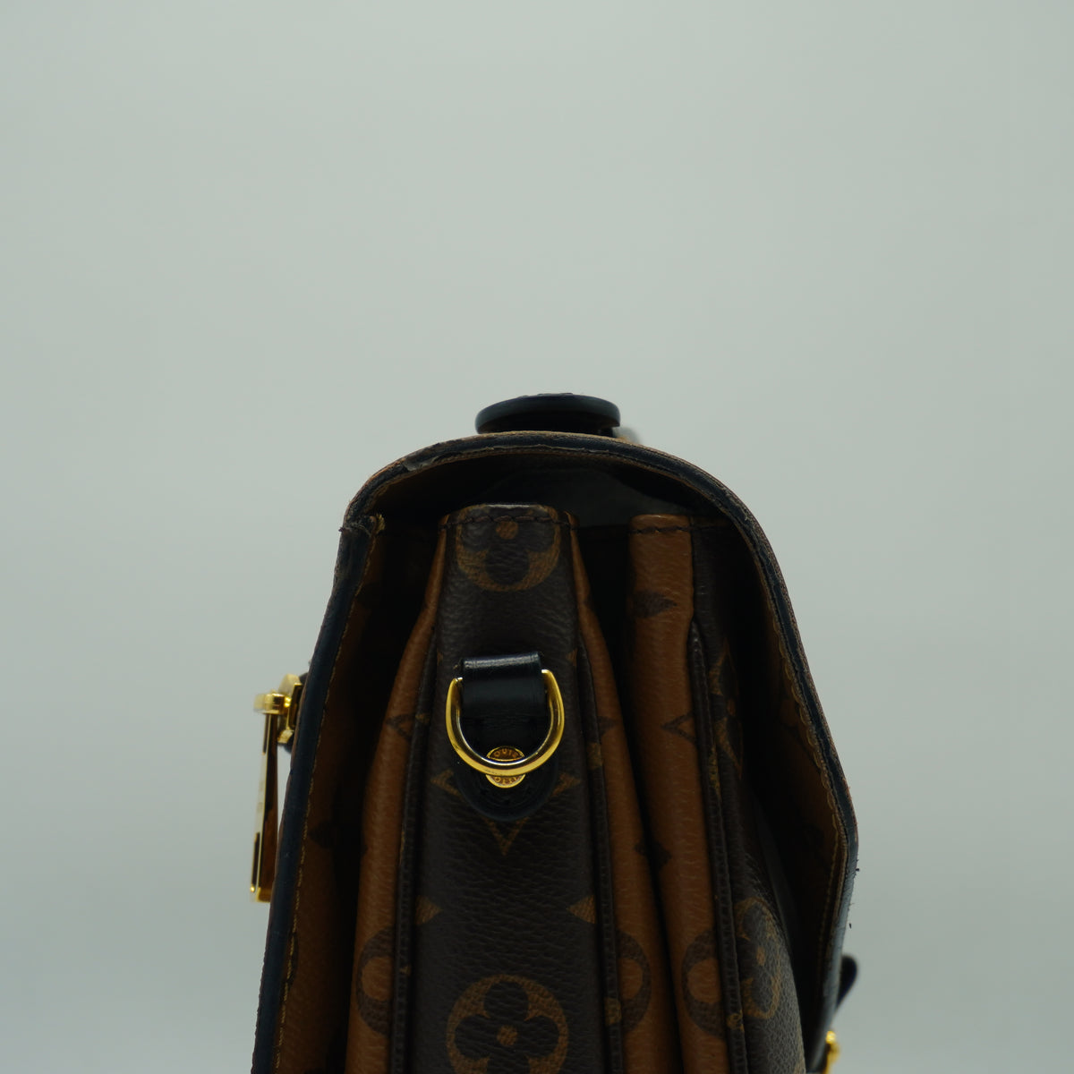 Louis Vuitton	Pochette Métis Small Monogram Reverse Canvas GHW