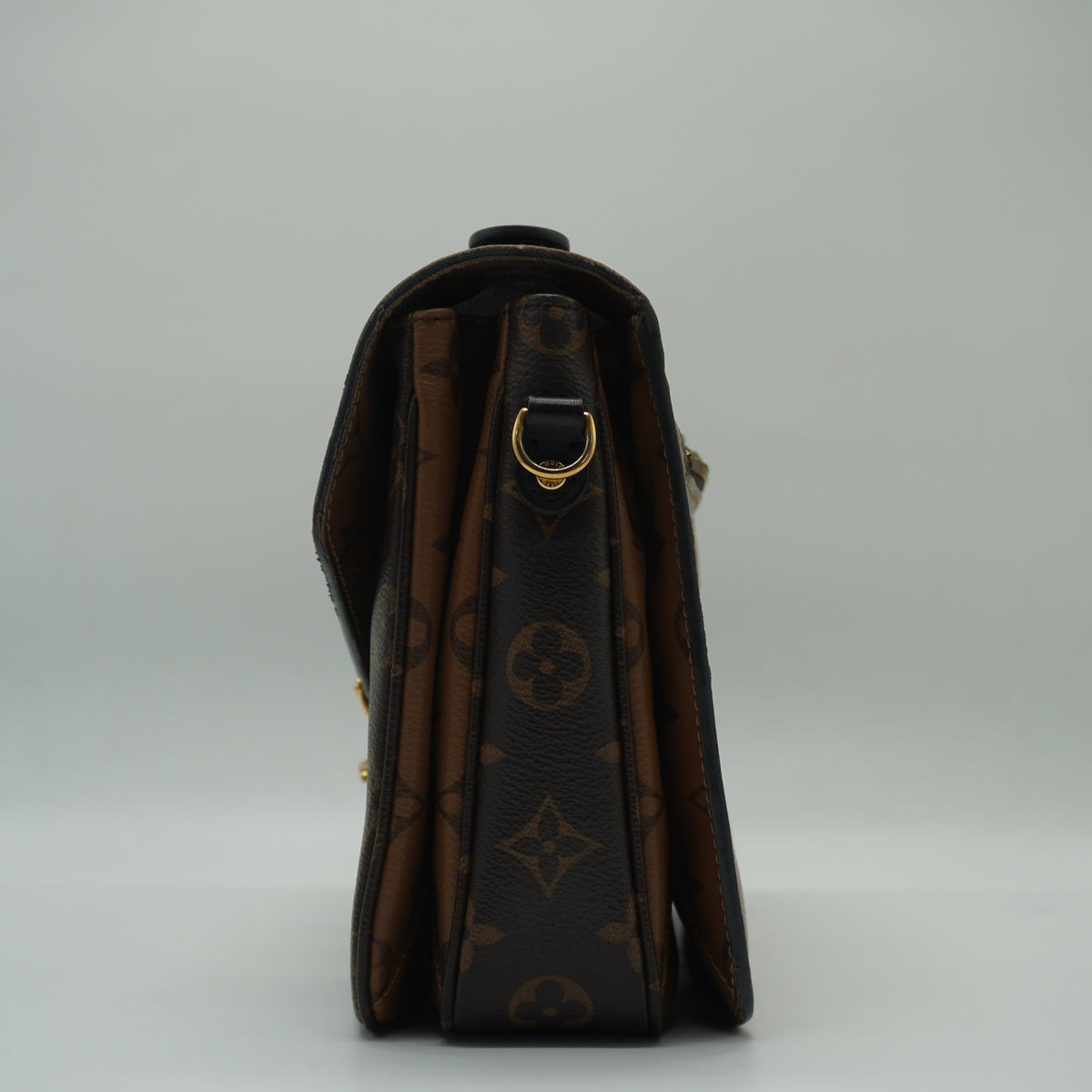 Louis Vuitton	Pochette Métis Small Monogram Reverse Canvas GHW