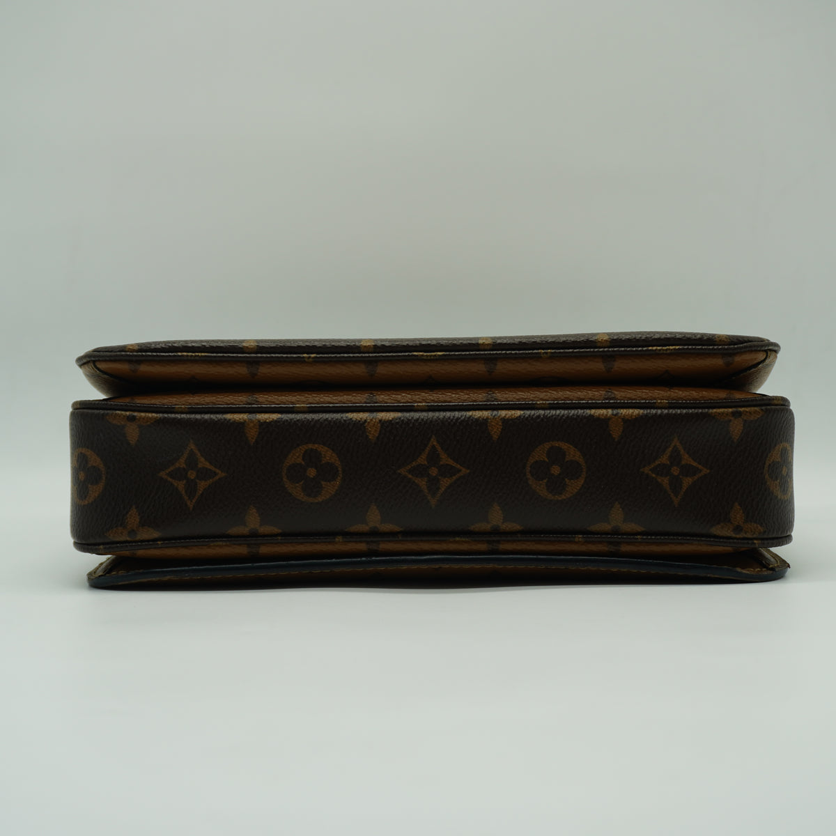Louis Vuitton	Pochette Métis Small Monogram Reverse Canvas GHW