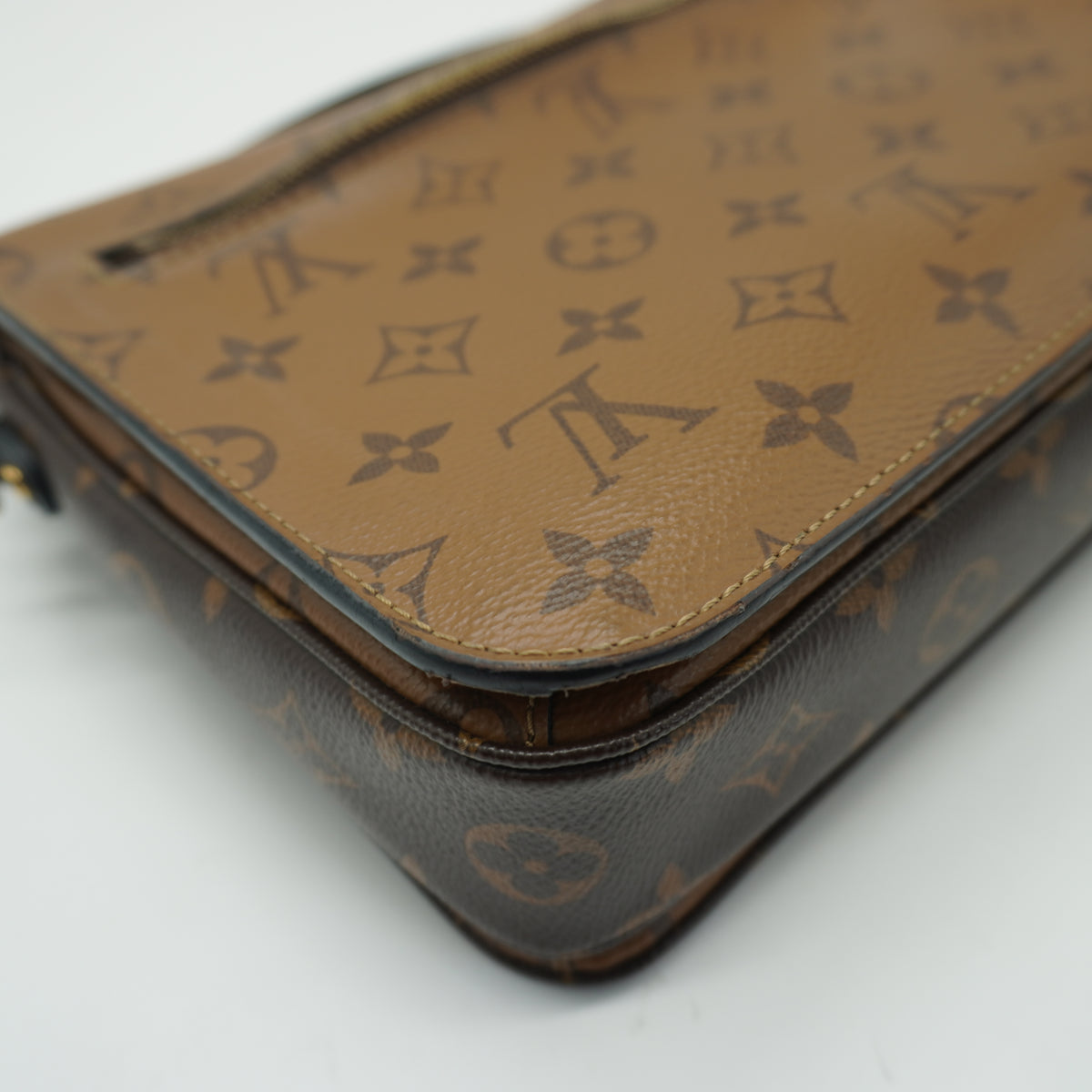 Louis Vuitton	Pochette Métis Small Monogram Reverse Canvas GHW