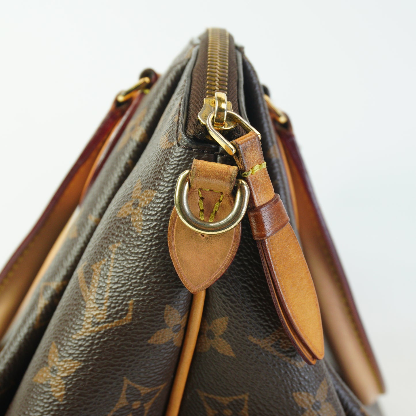 Louis Vuitton	Rivoli Mono Medium GHW