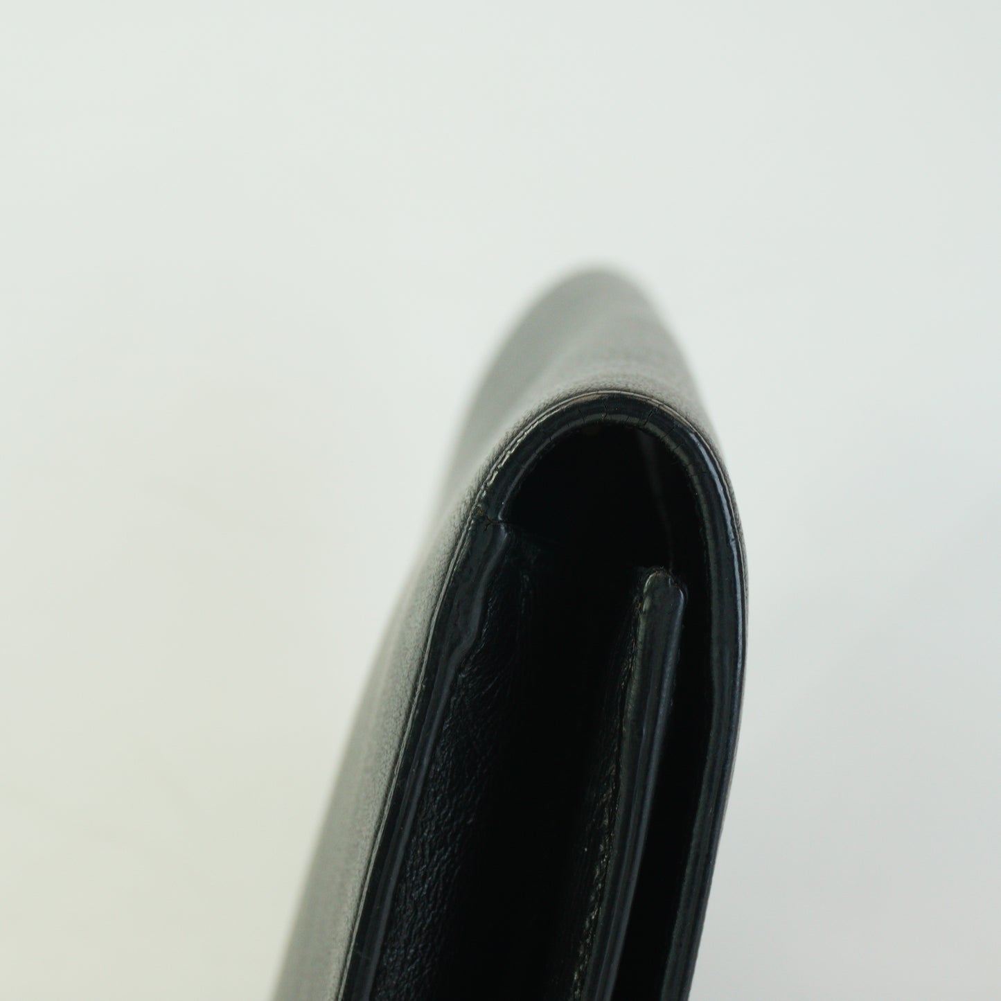 YSL	Belle de jour Black Leather Clutch GHW