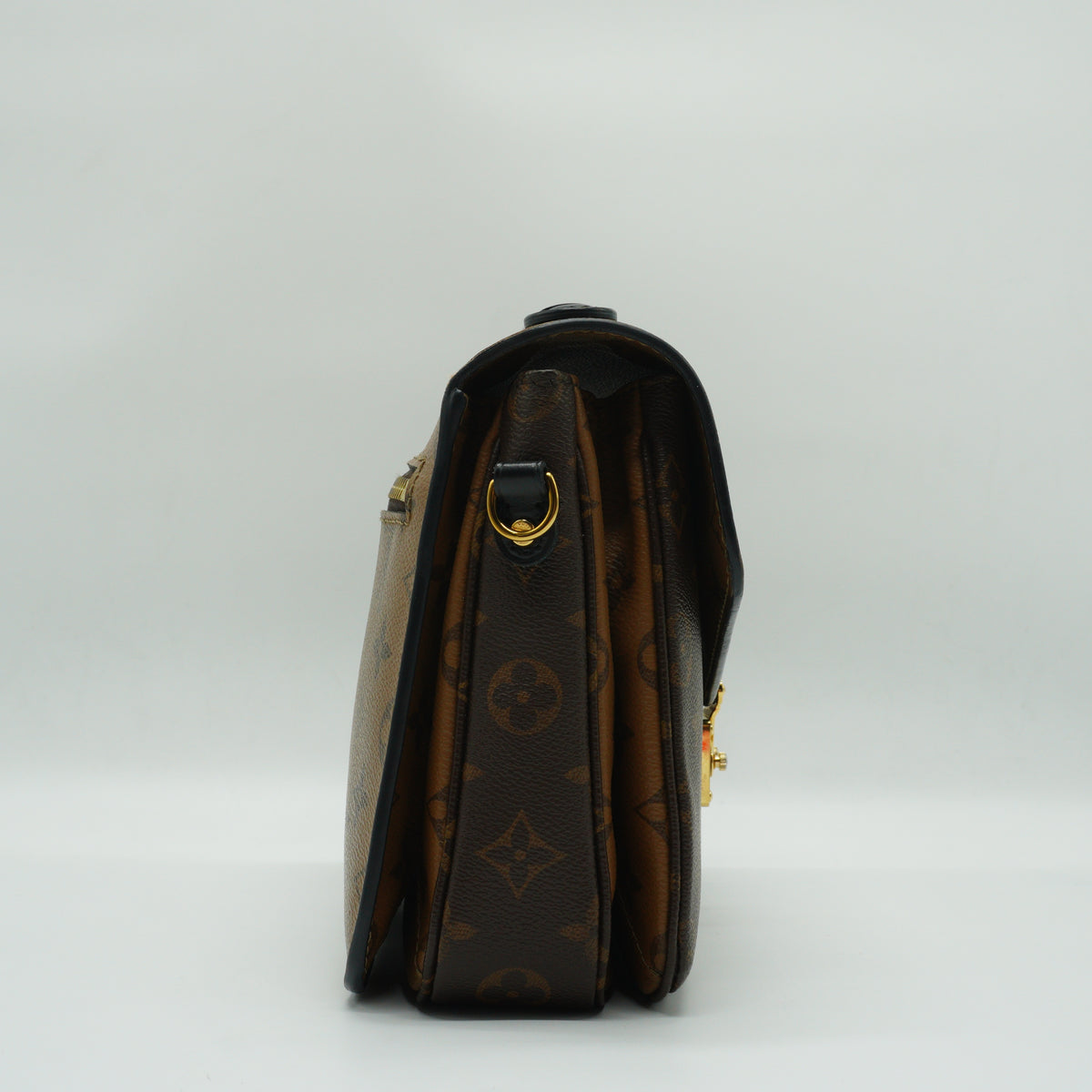 Louis Vuitton	Pochette Métis Medium monogram reverse GHW