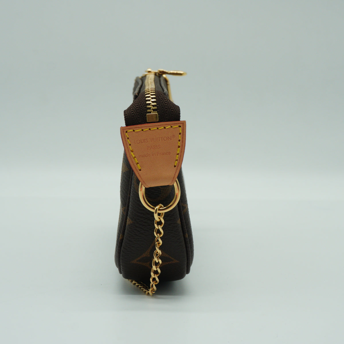 Louis Vuitton	Pochette Accesoires Monogram Mini GHW