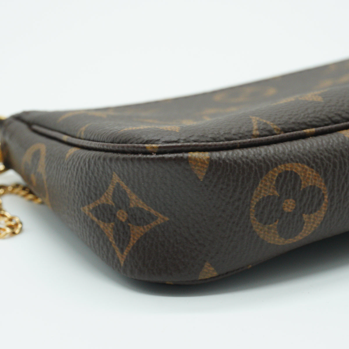 Louis Vuitton	Pochette Accesoires Monogram Mini GHW