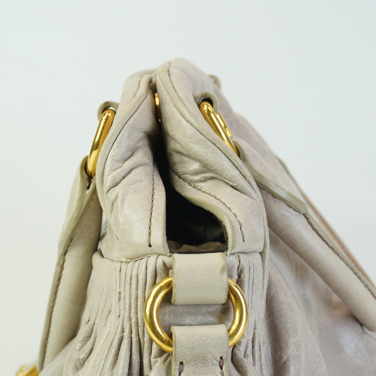 MiuMiu	Nappa Leather Charm Top Handle Bag GHW Small