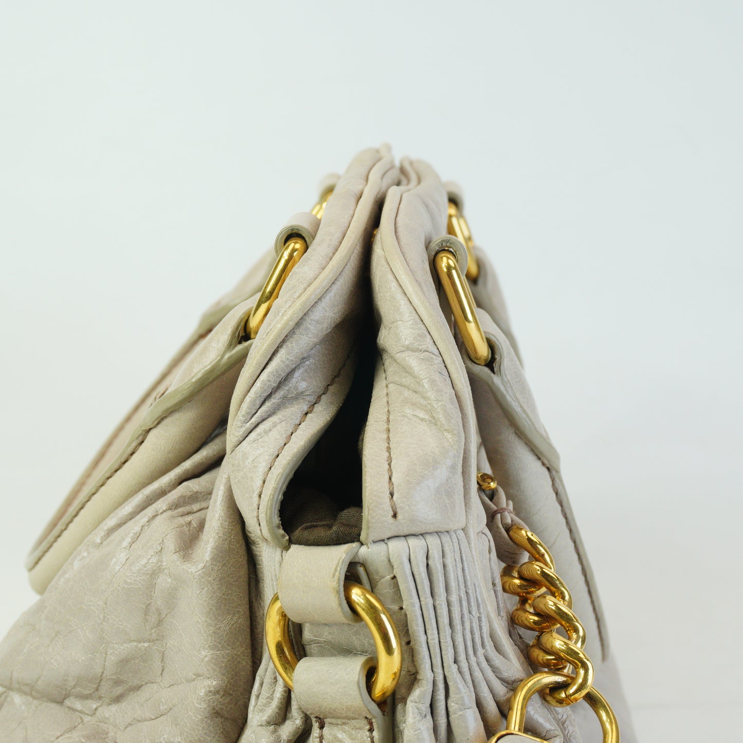 MiuMiu	Nappa Leather Charm Top Handle Bag GHW Small