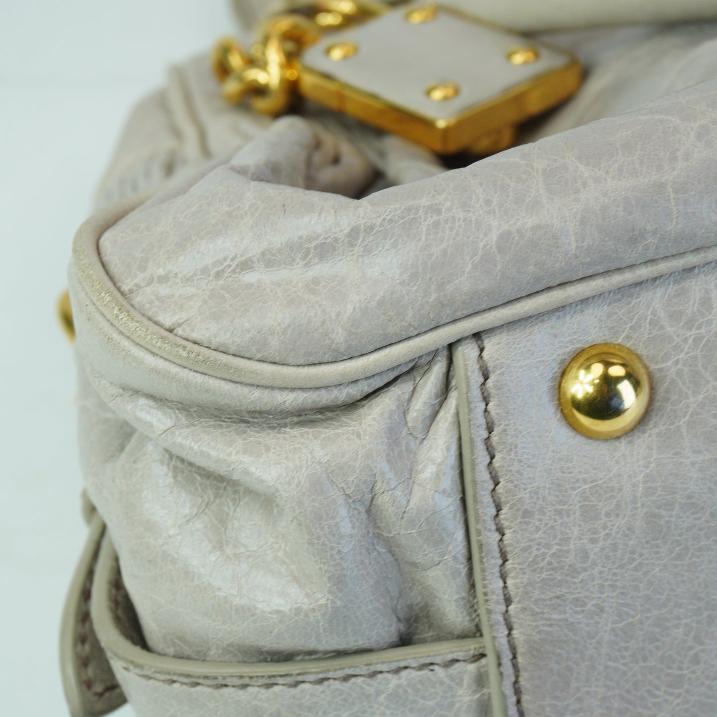 MiuMiu	Nappa Leather Charm Top Handle Bag GHW Small