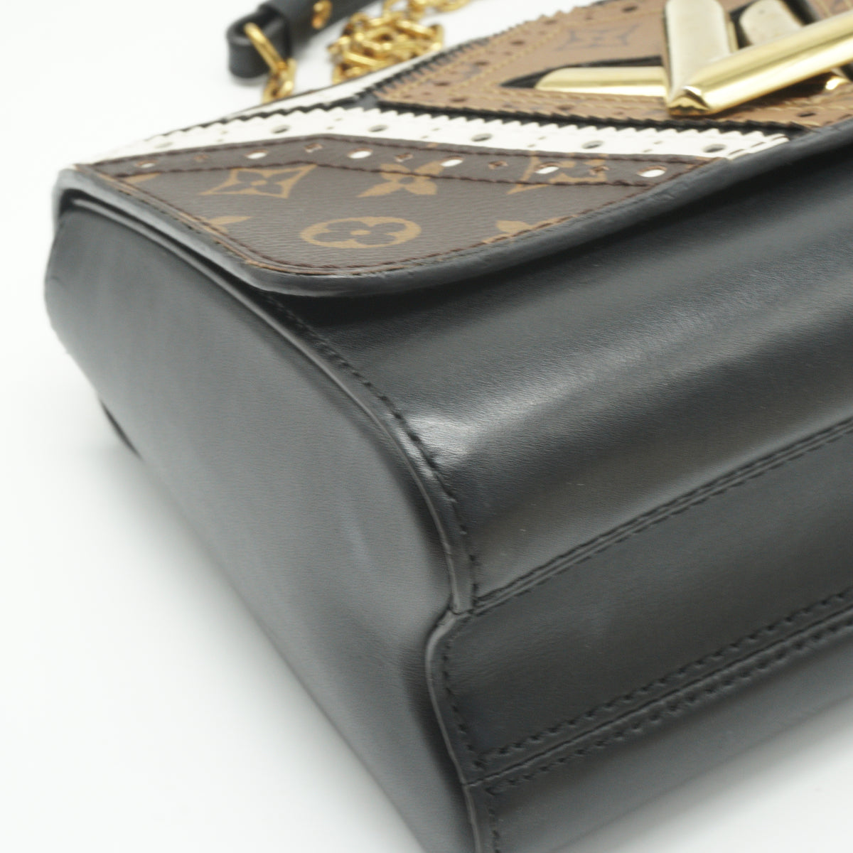 Louis Vuitton	Twist Handbag Limited Edition Brogue Reverse Monogram Canvas and Leather MM GHW