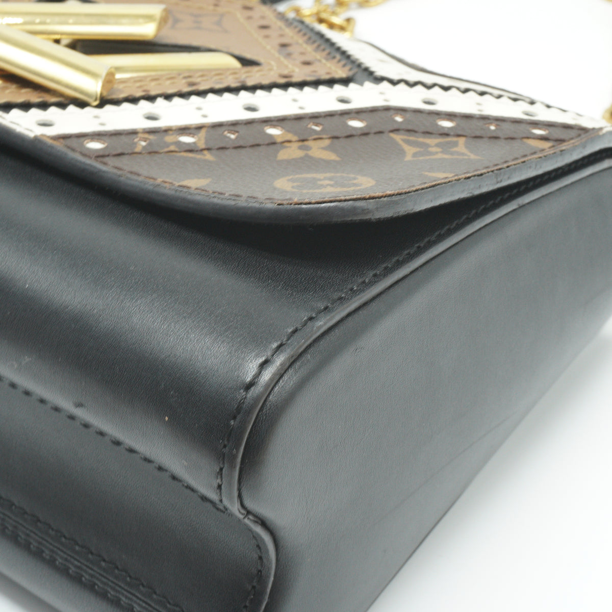 Louis Vuitton	Twist Handbag Limited Edition Brogue Reverse Monogram Canvas and Leather MM GHW