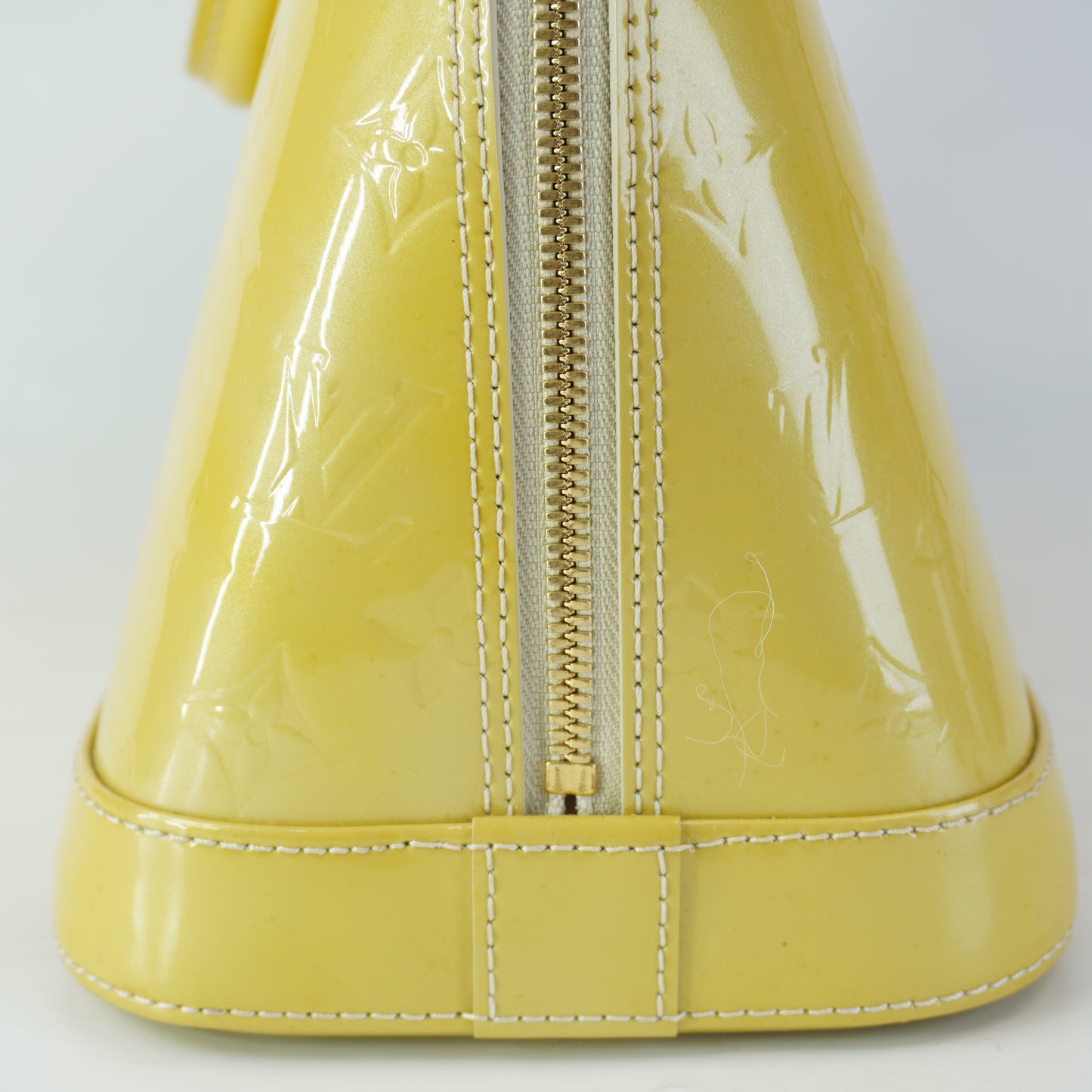 Louis Vuitton	Alma PM Yellow Mono Vernis Patent