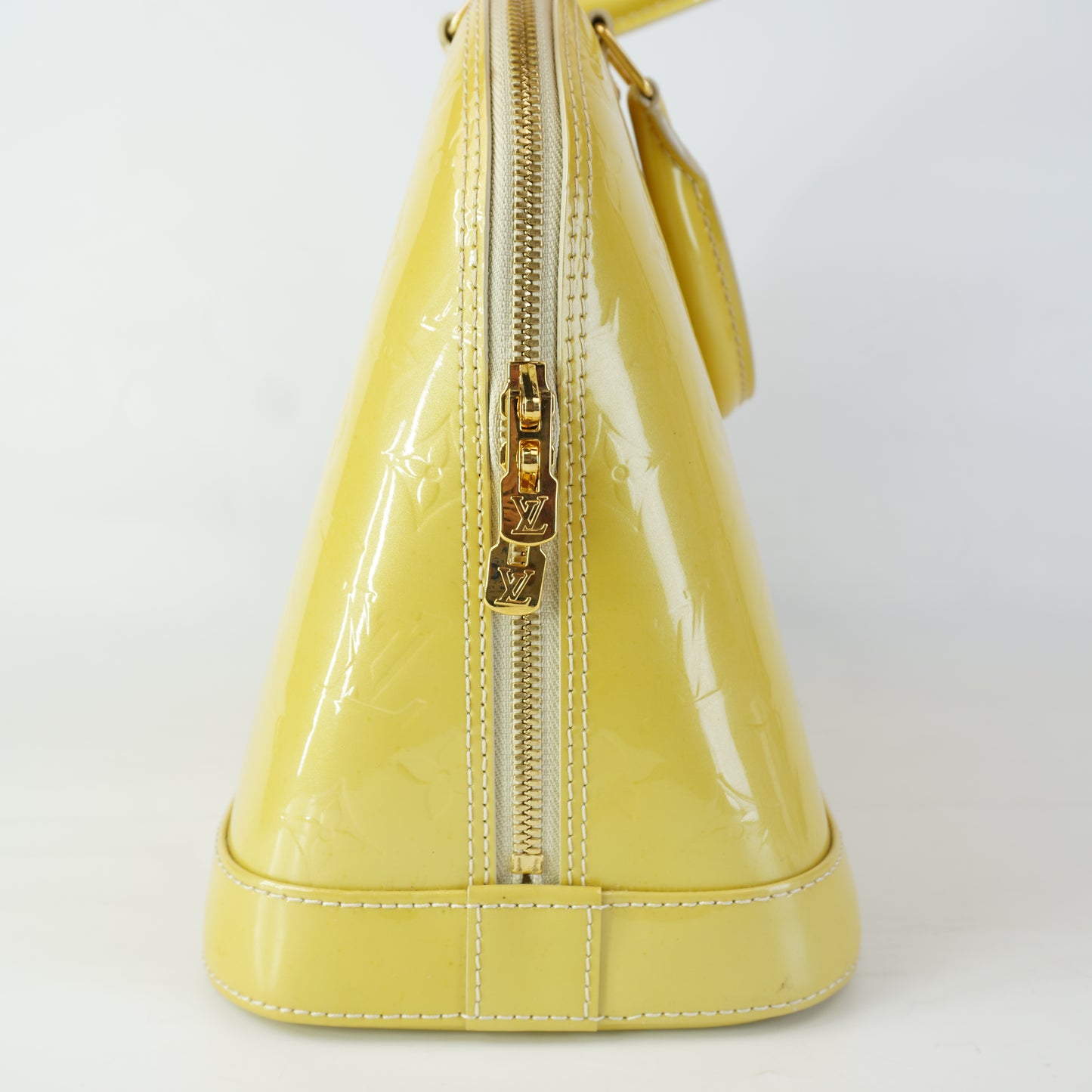 Louis Vuitton	Alma PM Yellow Mono Vernis Patent