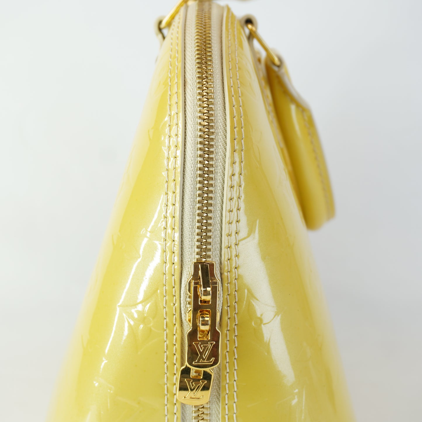 Louis Vuitton	Alma PM Yellow Mono Vernis Patent