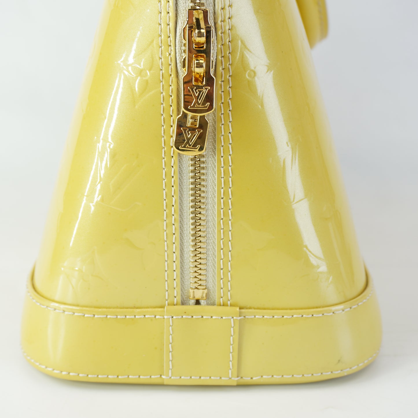 Louis Vuitton	Alma PM Yellow Mono Vernis Patent