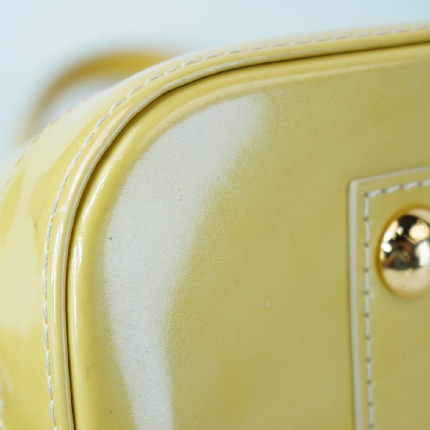 Louis Vuitton	Alma PM Yellow Mono Vernis Patent