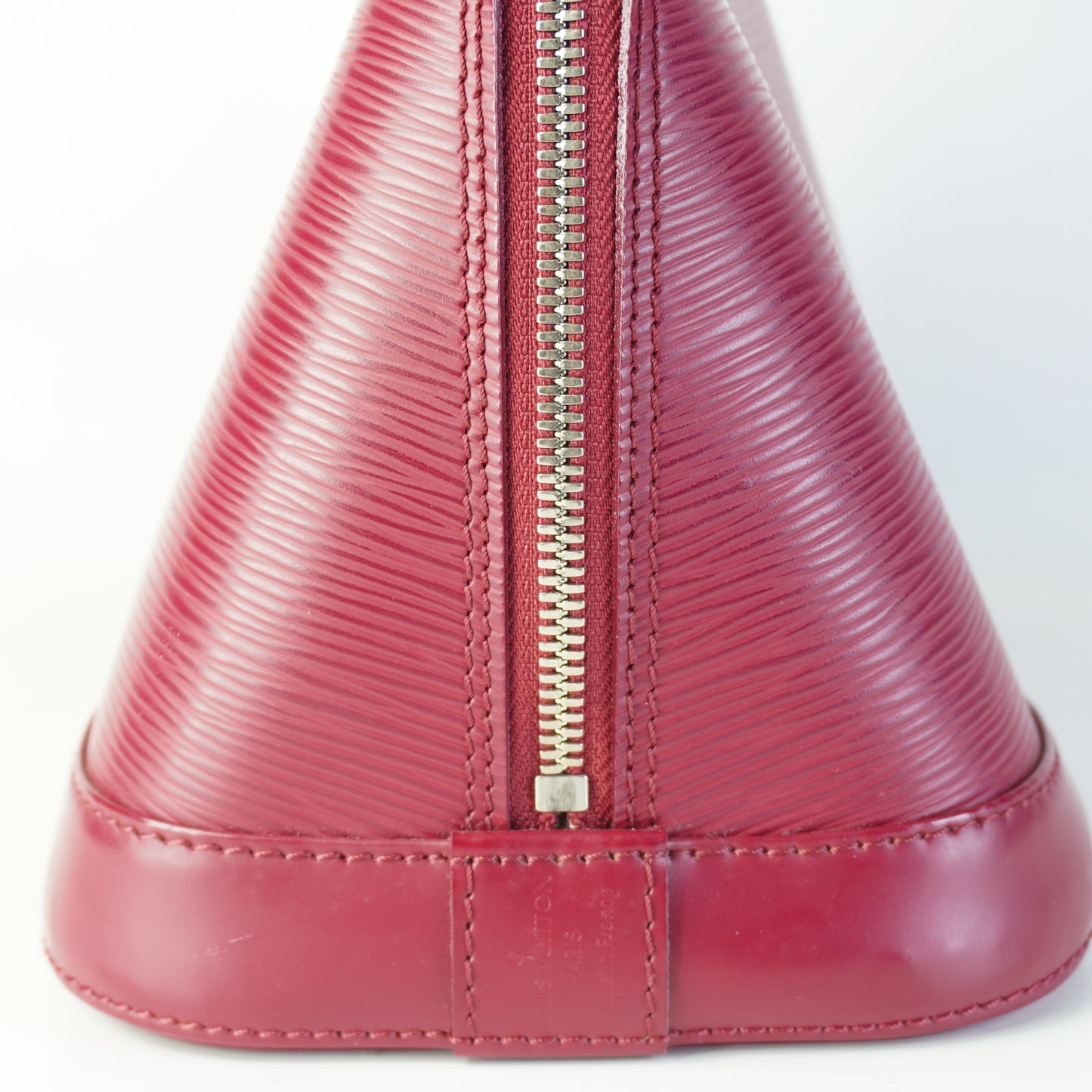 Louis Vuitton	Alma Handbag Epi Leather Burgundy