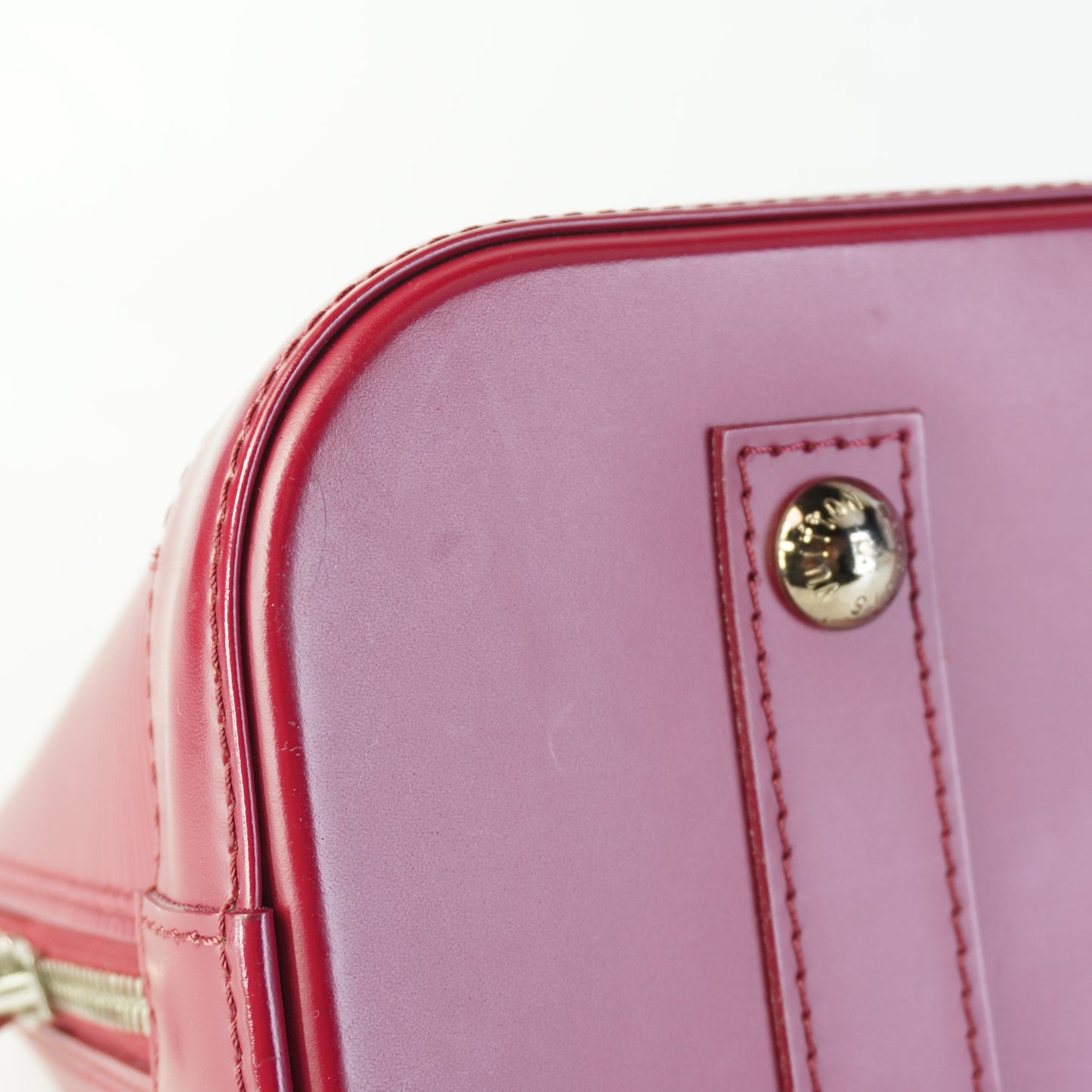 Louis Vuitton	Alma Handbag Epi Leather Burgundy