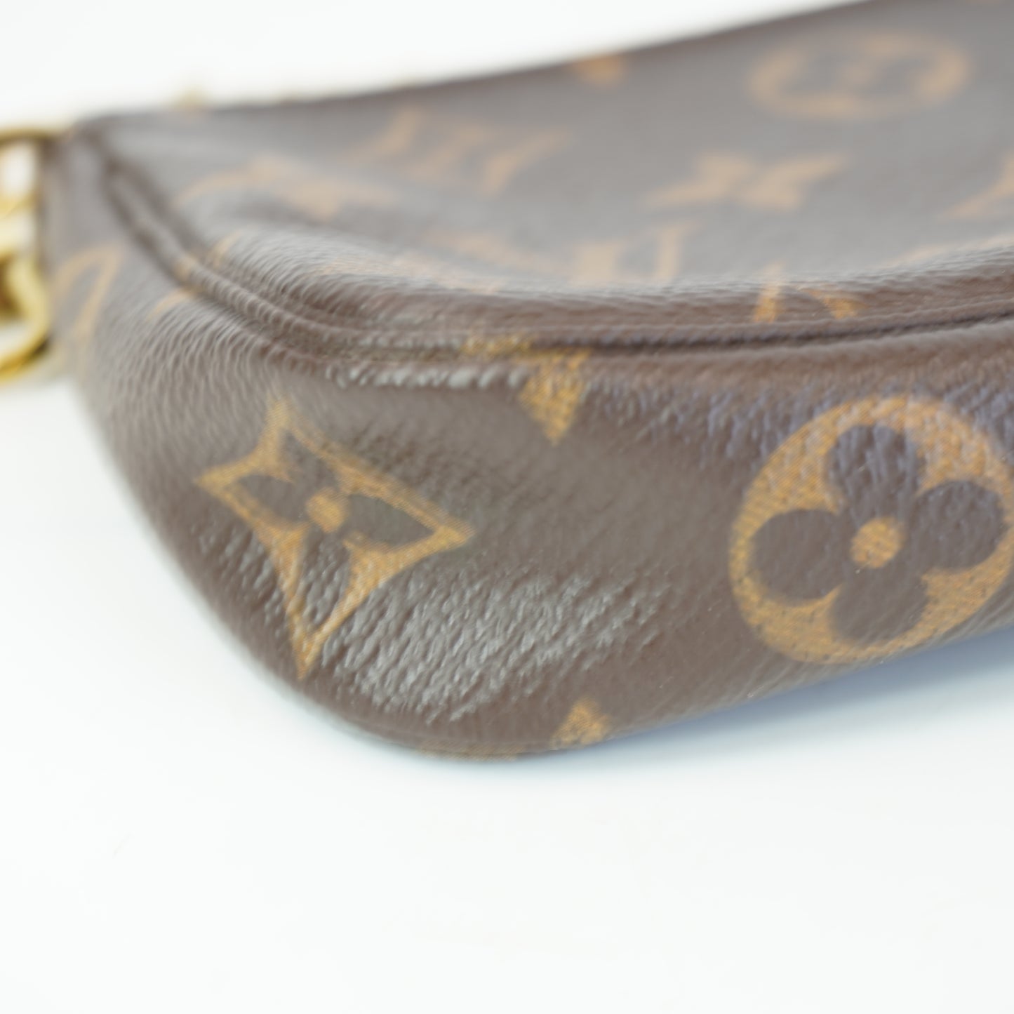 Louis Vuitton	Mini Pochette Mono