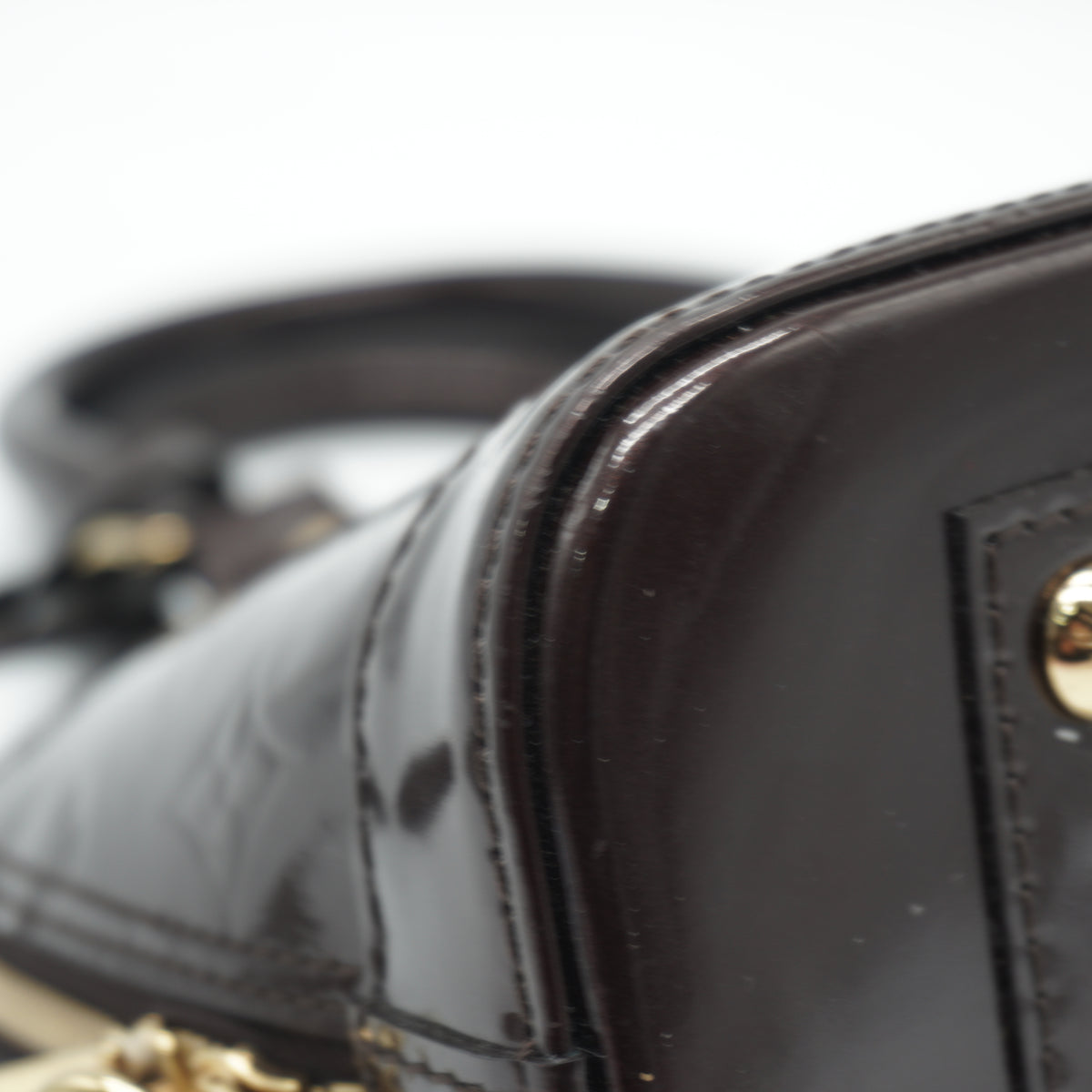 Louis Vuitton	Alma BB Patent Vernis Burgundy GHW