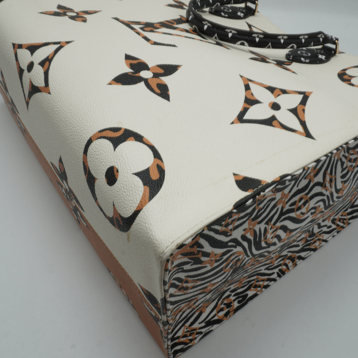 Louis Vuitton	OTG Monogram Giant Jungle