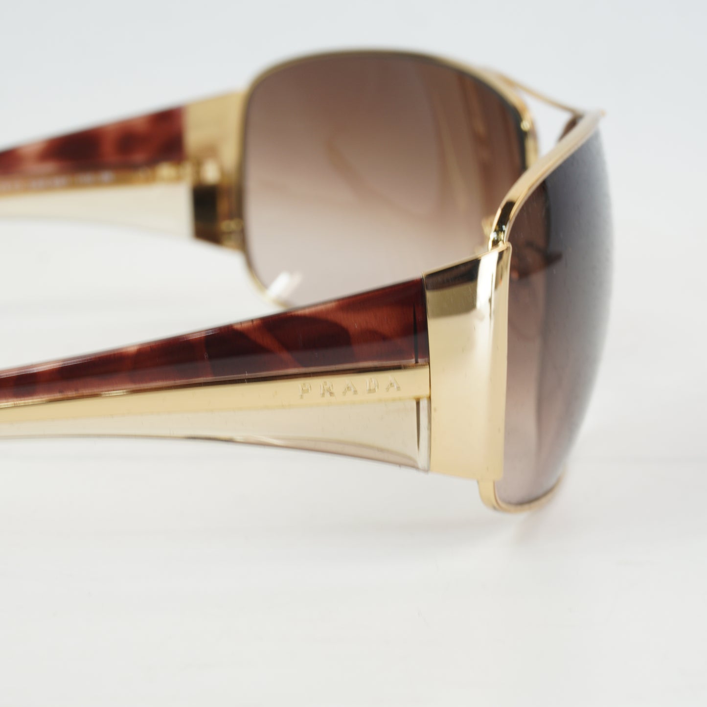 Prada SPR74 Gold-Tone Sunglasses