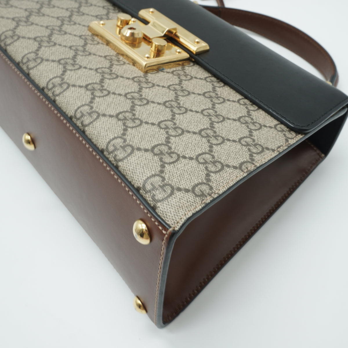 Gucci	Padlock GG Supreme Top Handle Medium GHW