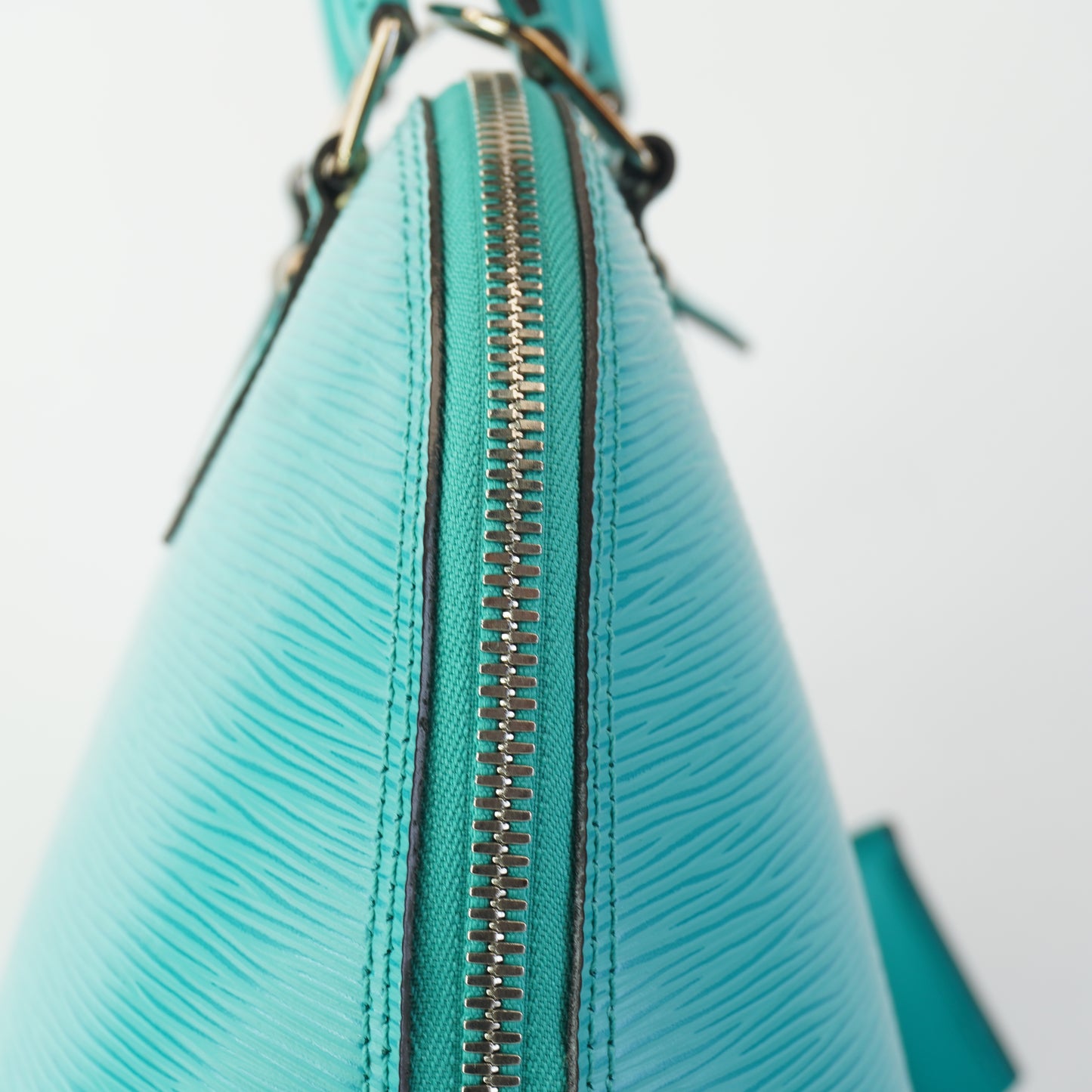 Louis Vuitton	Alma Epi Leather Turquoise