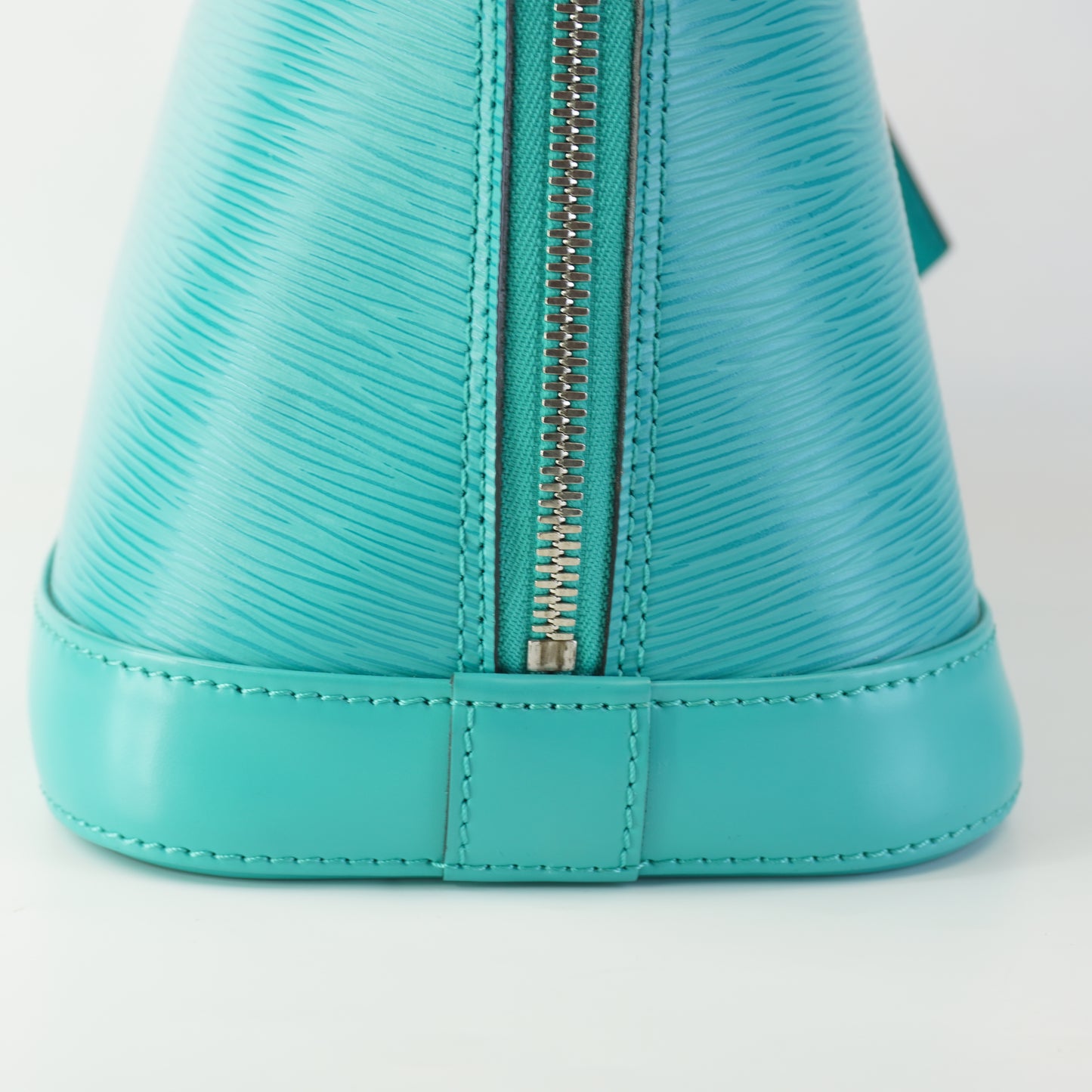 Louis Vuitton	Alma Epi Leather Turquoise