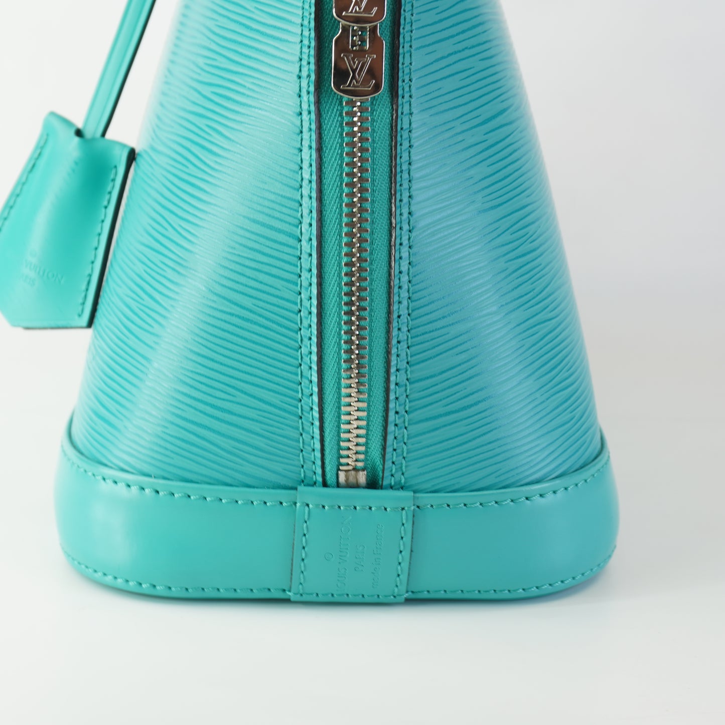 Louis Vuitton	Alma Epi Leather Turquoise