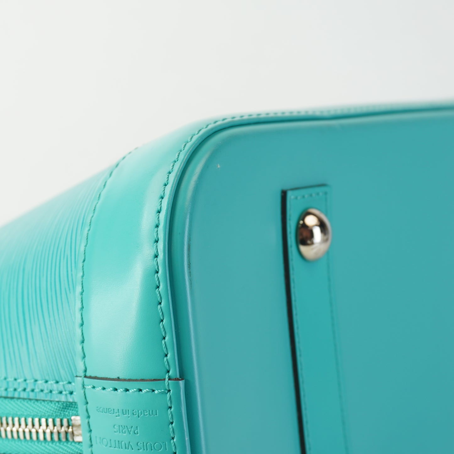 Louis Vuitton	Alma Epi Leather Turquoise