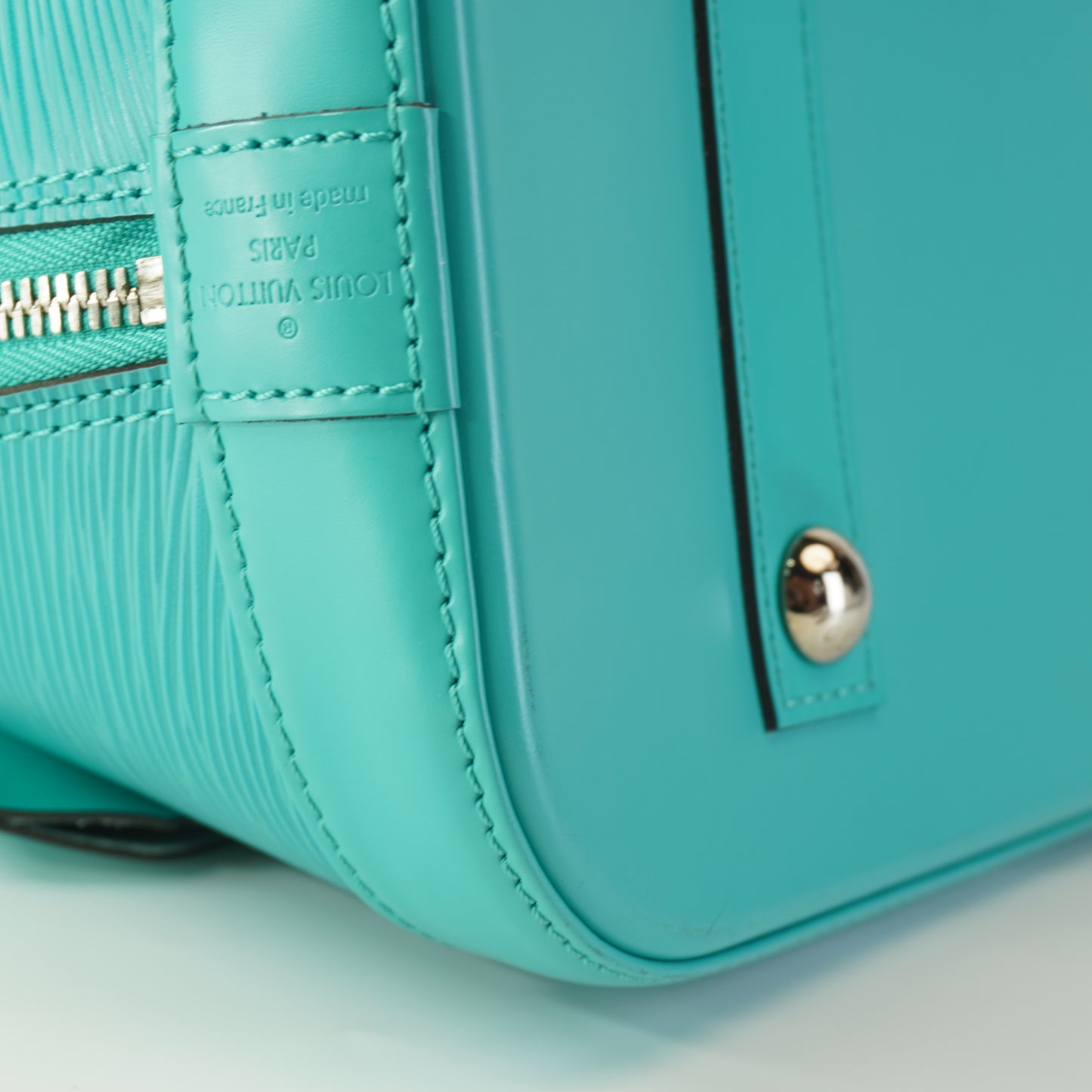 Louis Vuitton	Alma Epi Leather Turquoise