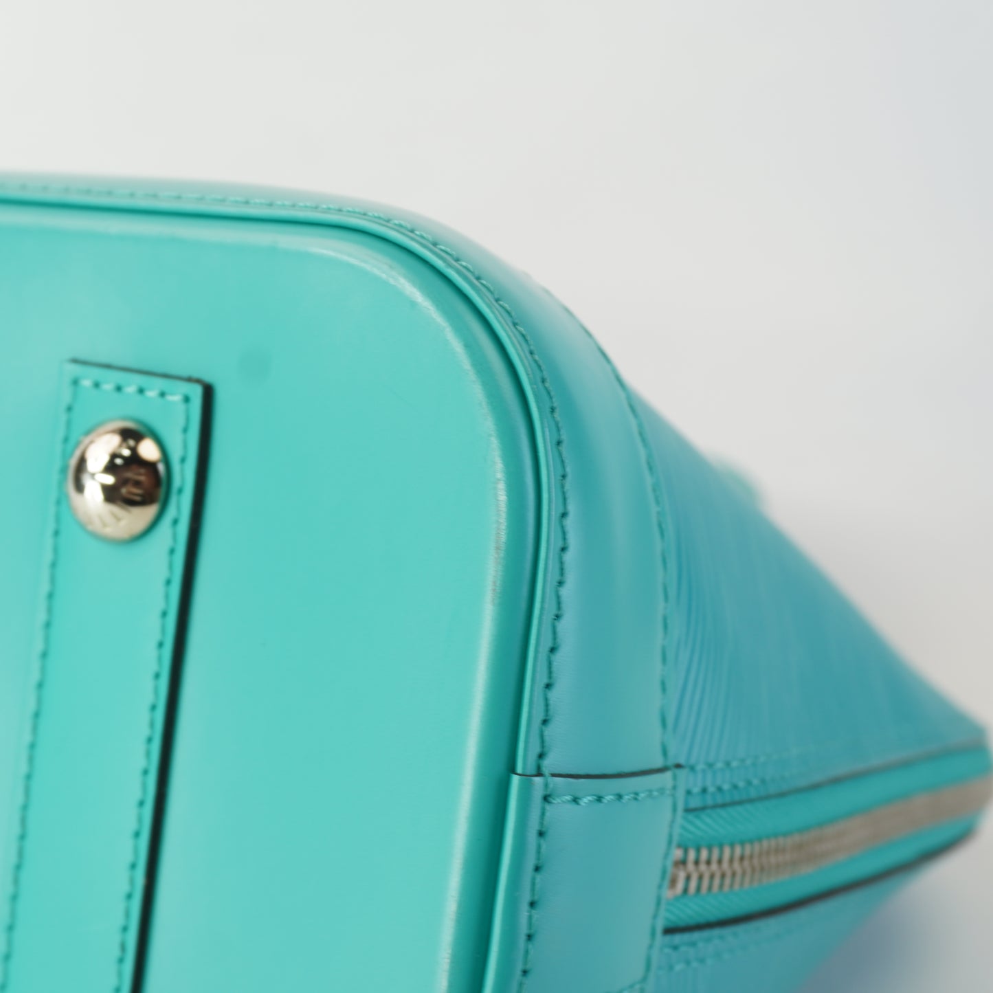 Louis Vuitton	Alma Epi Leather Turquoise