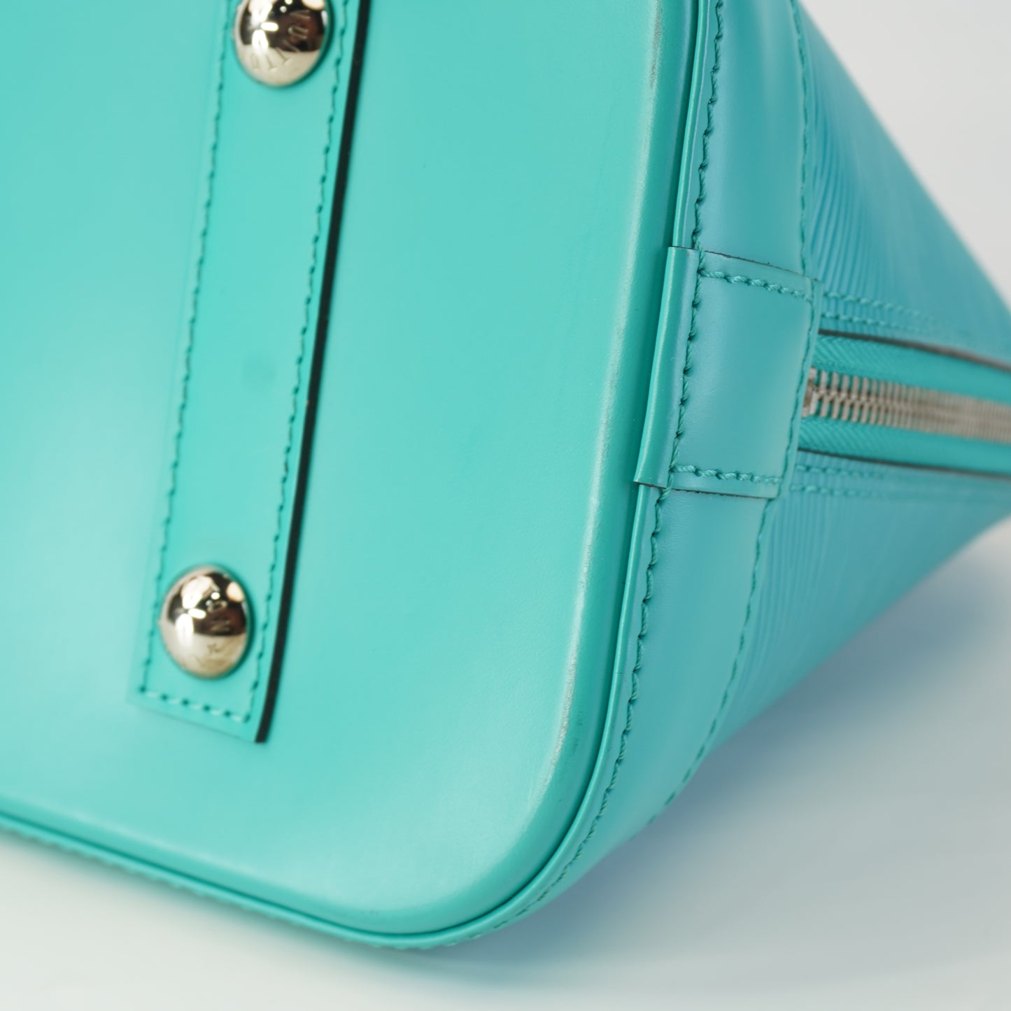 Louis Vuitton	Alma Epi Leather Turquoise