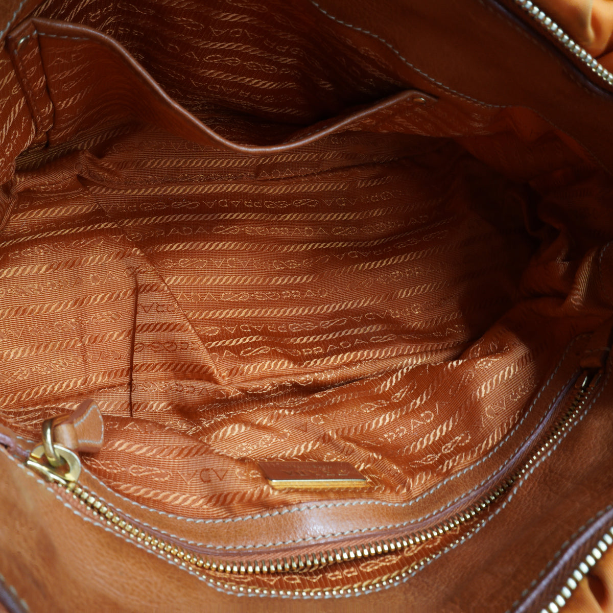 Prada	Tessuto Gaufre Convertible Satchel Orange Medium GHW