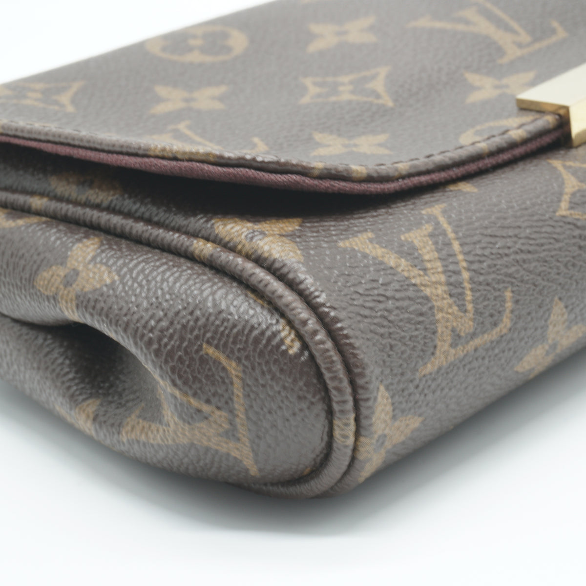 Louis Vuitton	Favorite MM Monogram Canvas Bag GHW