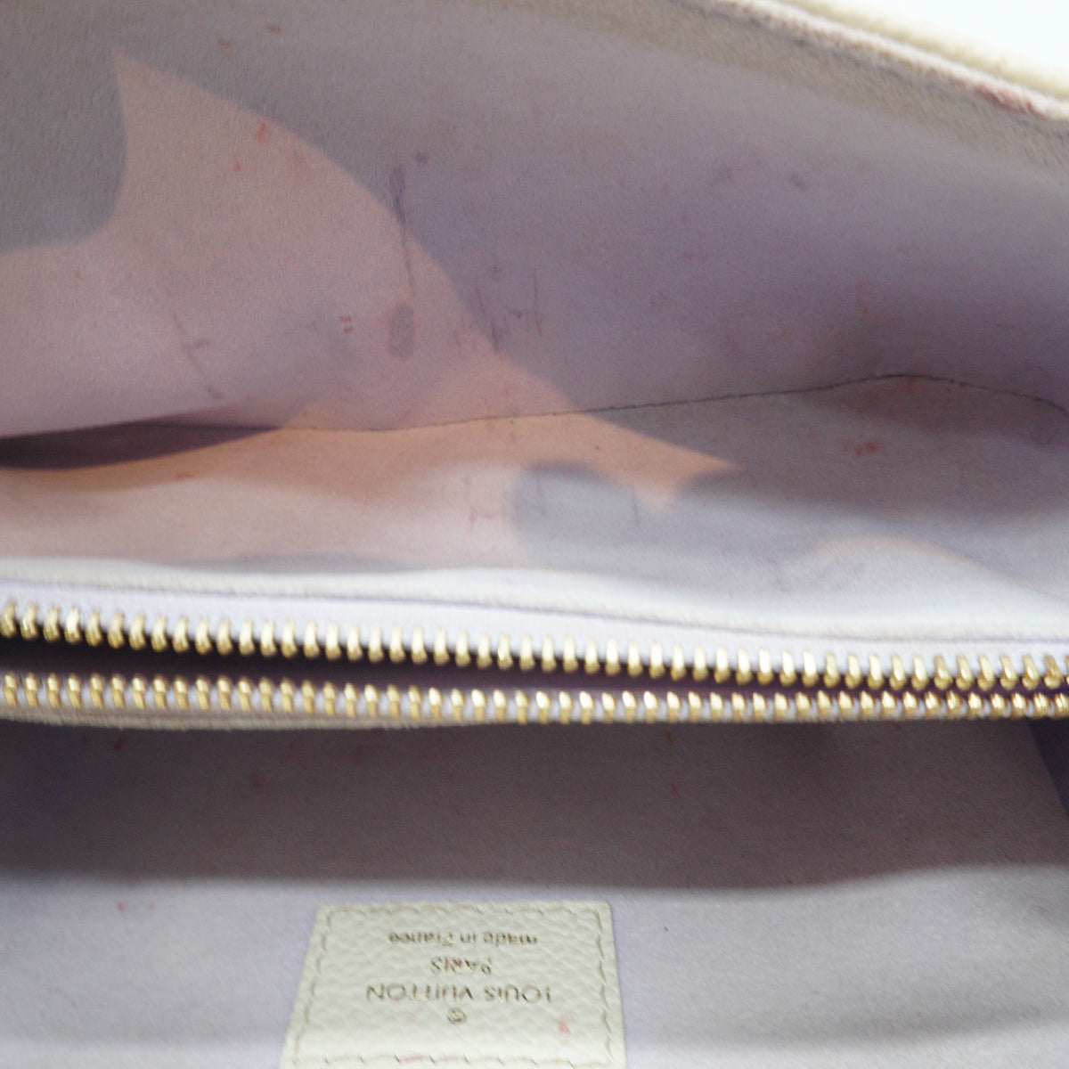 Louis Vuitton	Pochette Métis East West bag in the latte and bubble tea bicolour Small GHW