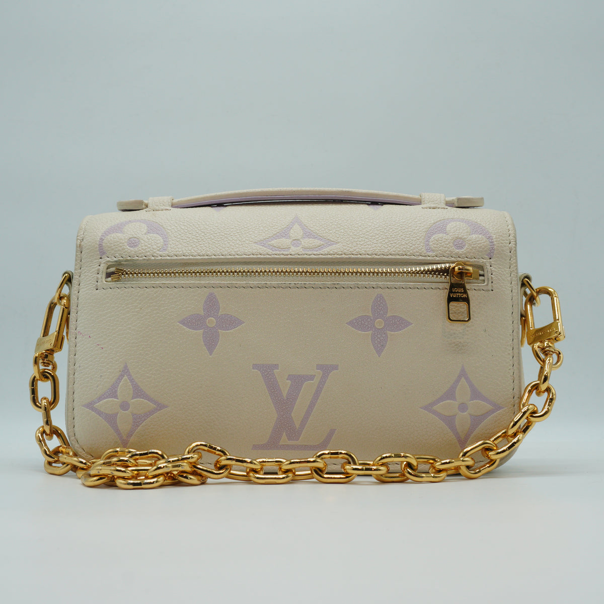 Louis Vuitton	Pochette Métis East West bag in the latte and bubble tea bicolour Small GHW