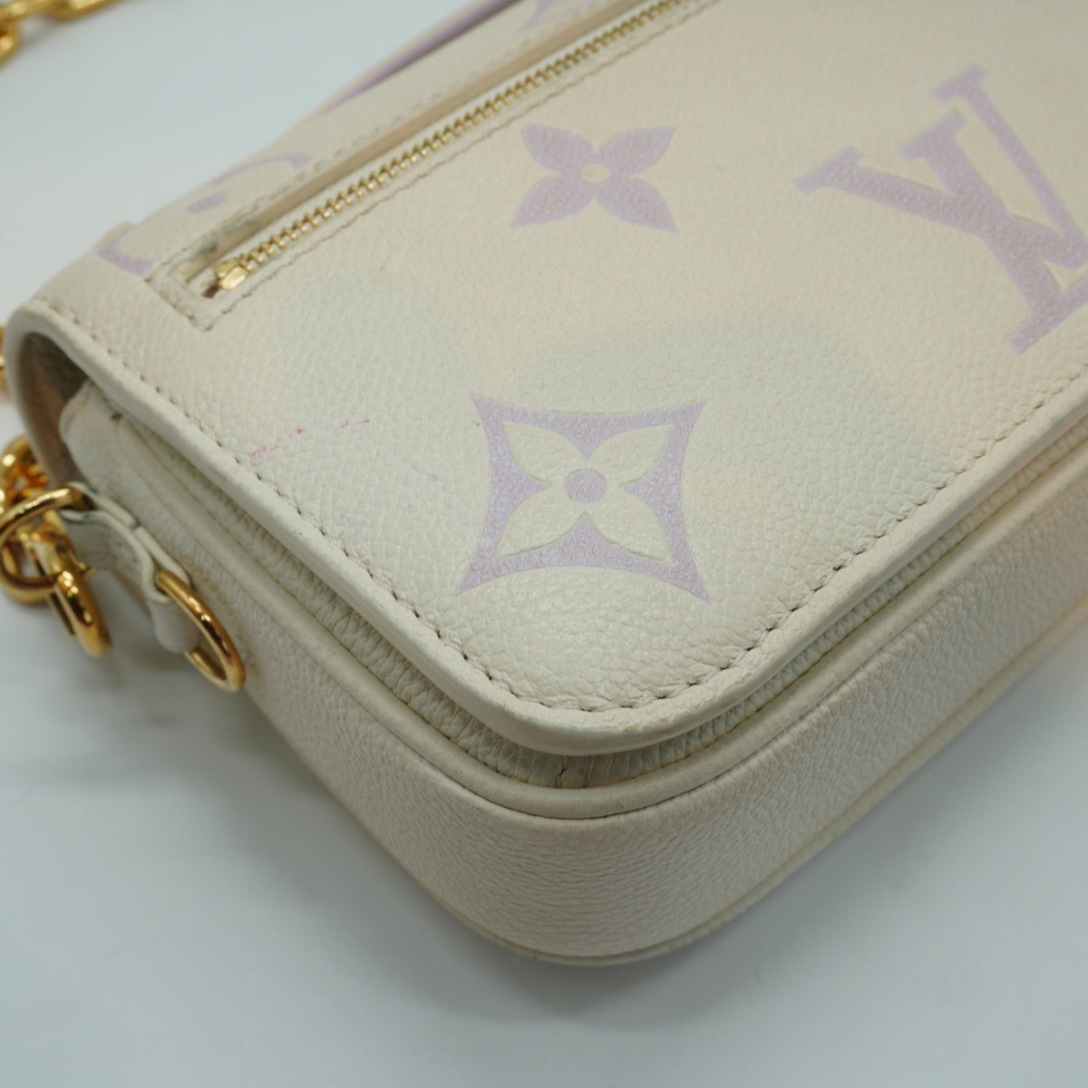 Louis Vuitton	Pochette Métis East West bag in the latte and bubble tea bicolour Small GHW