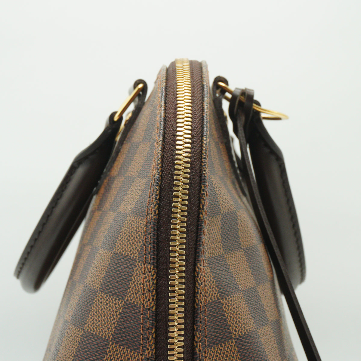 Louis Vuitton	Alma PM Damier Ebene GHW