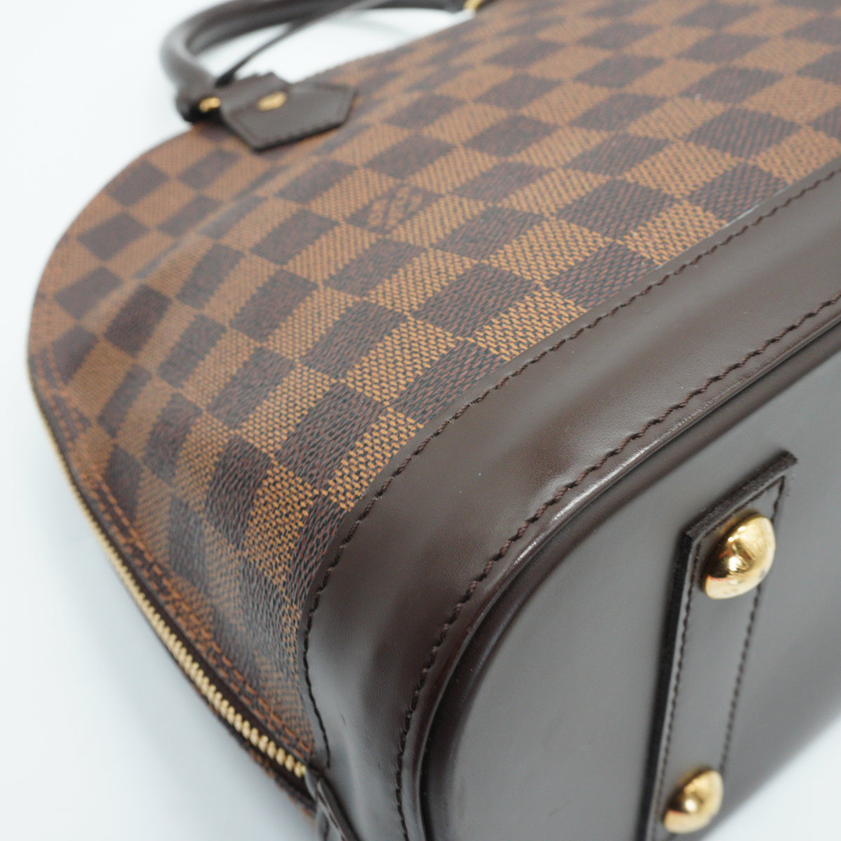 Louis Vuitton	Alma PM Damier Ebene GHW