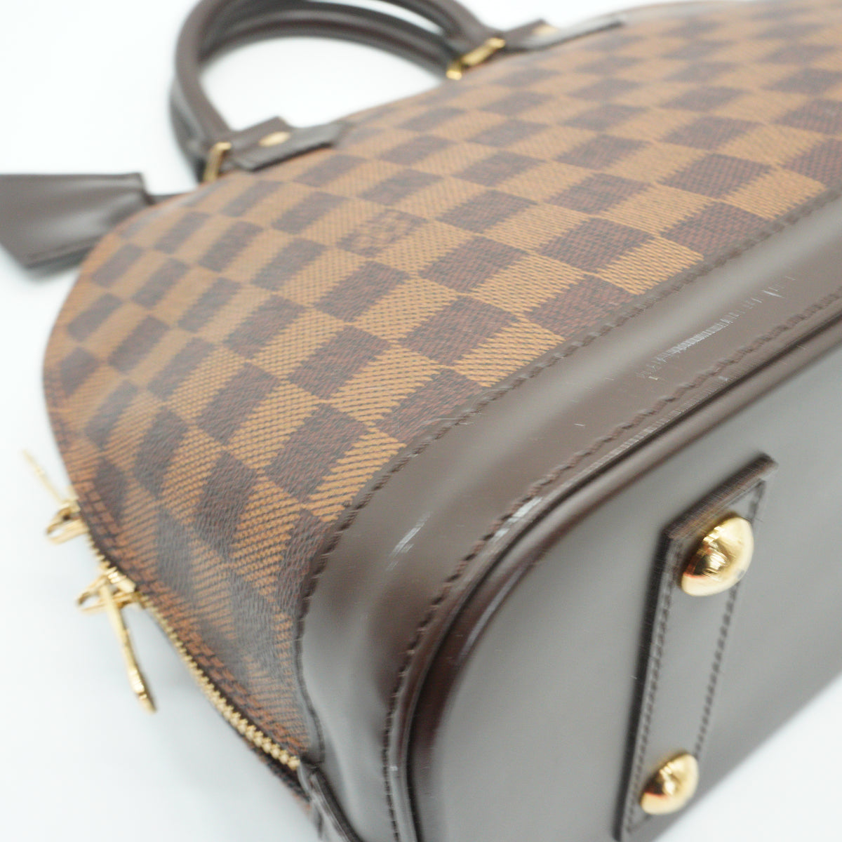 Louis Vuitton	Alma PM Damier Ebene GHW