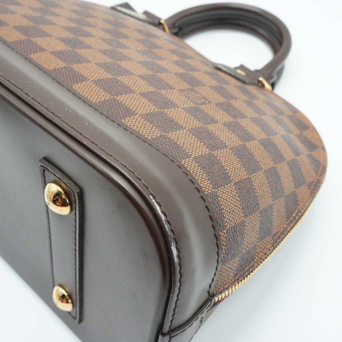 Louis Vuitton	Alma PM Damier Ebene GHW