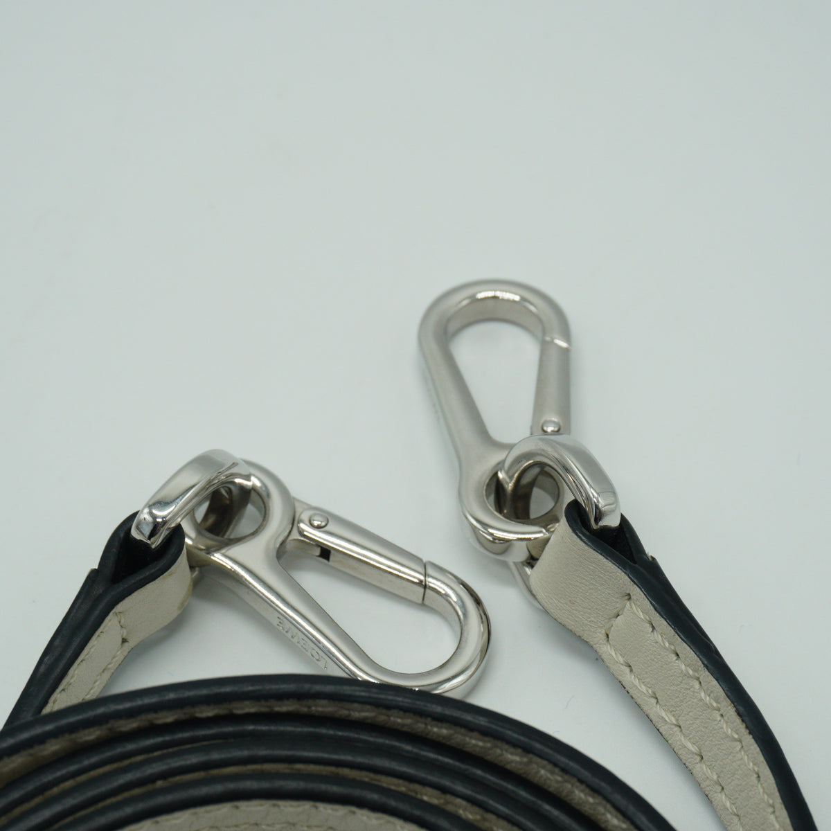Loewe	Mini Puzzle Bag in a color-blocked soft white rosemary green and black