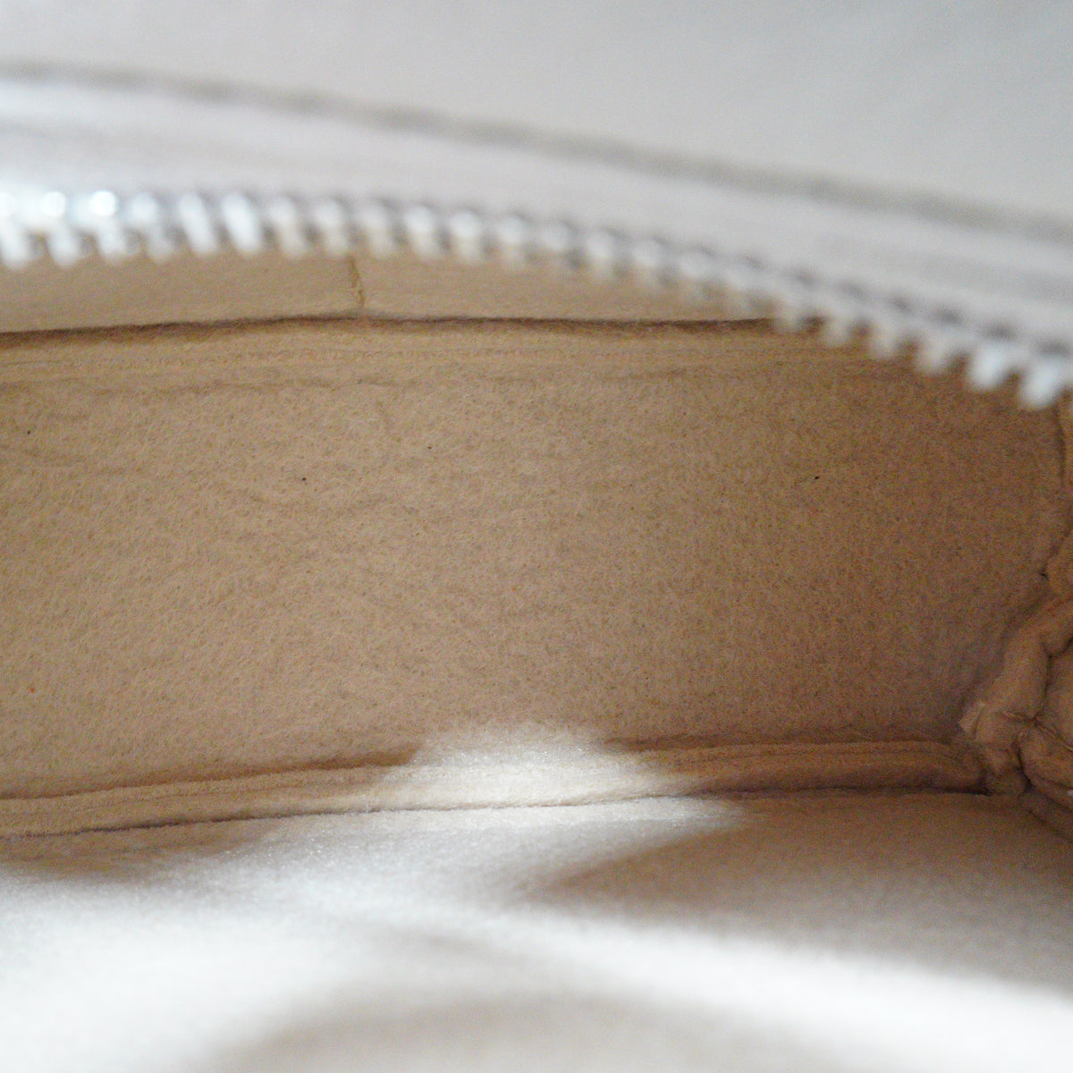 Loewe	Mini Puzzle Bag in a color-blocked soft white rosemary green and black