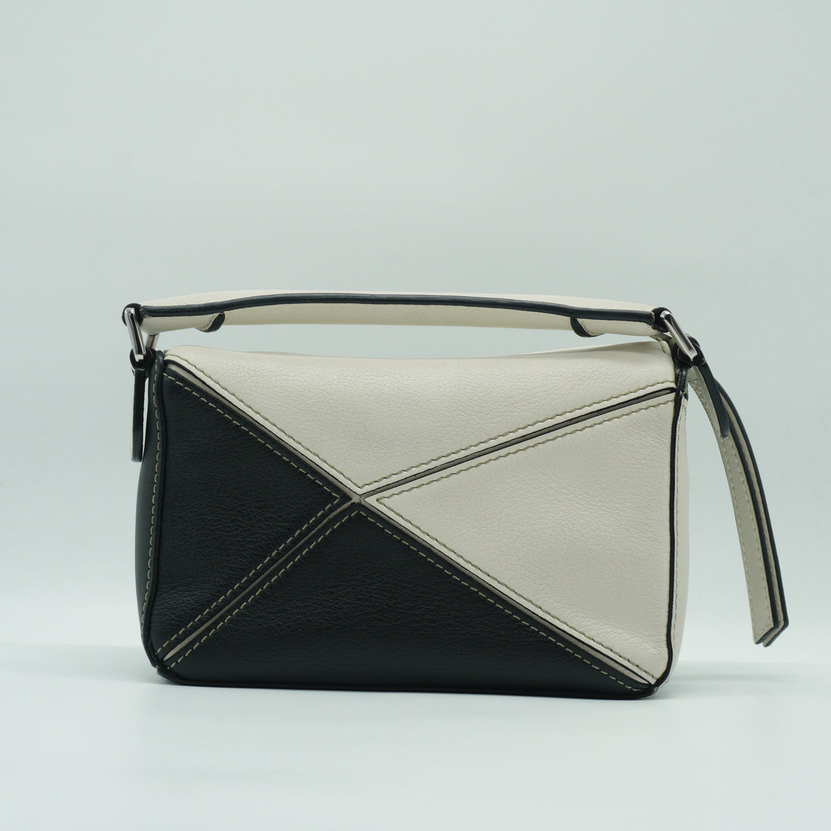 Loewe	Mini Puzzle Bag in a color-blocked soft white rosemary green and black