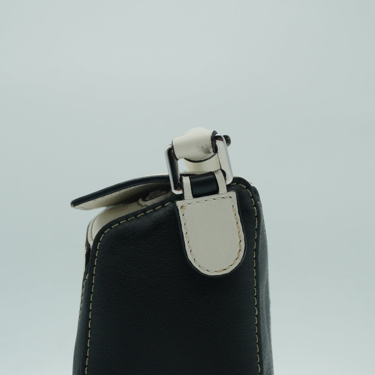 Loewe	Mini Puzzle Bag in a color-blocked soft white rosemary green and black