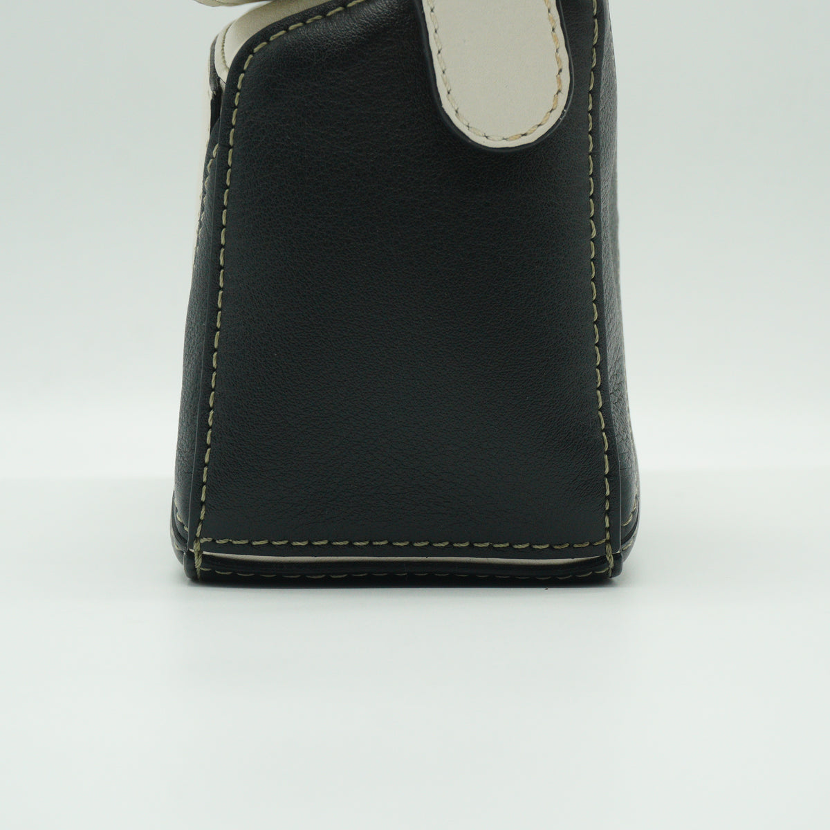 Loewe	Mini Puzzle Bag in a color-blocked soft white rosemary green and black