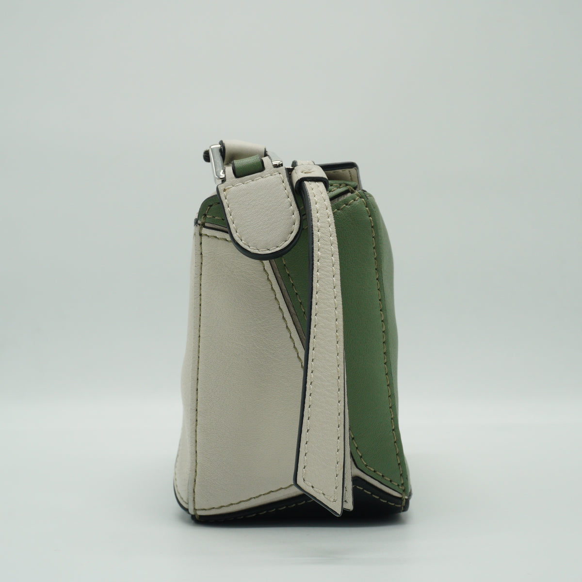 Loewe	Mini Puzzle Bag in a color-blocked soft white rosemary green and black